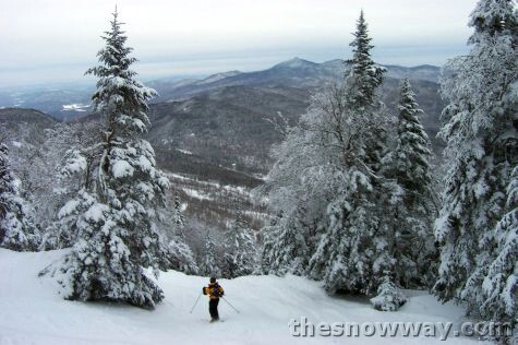 A skier on Fall Line with Camel's Hump in the Distance